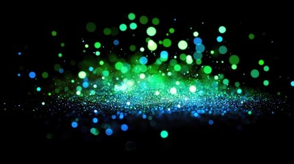 Wall Mural - Vibrant green and blue light bokeh explosion against black.