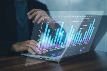 Wall Mural - business professional analyzing interactive digital bar charts to monitor performance metrics and dr
