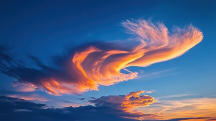 Wall Mural - a cloud formation resembling a dragon drifting across a twilight sky