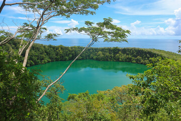 lake tolire besar on ternate island, north maluku seen from the side of the mountain, you can see sh