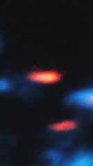 Wall Mural - abstract light patterns with vibrant red and blue hues in dark contrast