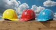 © Feb - Three Hard Hats on Wood Beam with Sky Background