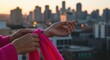 © Ihsanfrr - Tying scarf with city in background, photo
