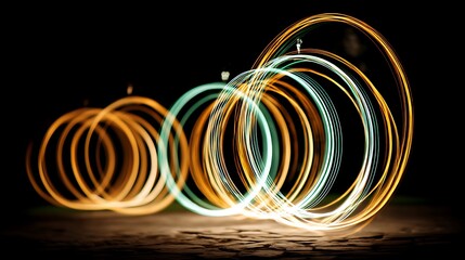 Wall Mural - dynamic light painting spirals in the dark artistic illumination abstract design and visual art.