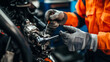 © dlu - Technician repairing a robotic arm used for lithium ore extraction. Featuring technical repair and equipment precision