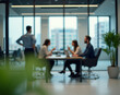 © Rakib Designer - Modern Office Scene with Blurred People in Casual Attire and Bokeh Background – Capturing a Contemporary Business Environment
