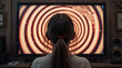 © Michael - Girl Watching Hypnotic Spiral on TV Screen. Influence of Media on People. Broadcast False Information, Hoax, Propaganda Brainwashing Disinformation. Manipulation Crowd Fakes, False Information.