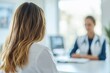 © YouraPechkin - Patient consultation in a bright clinic with a healthcare professional on a sunny day