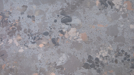 Fototapete - Gray black stone wall with many brown and blue structures as abstract rough textured background for page and banner templates.