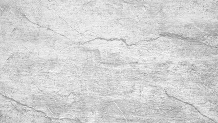 Aufkleber - A white background with a grey stone wall. The wall is rough and has a lot of texture.