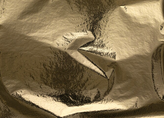 Fototapete - Gold foil texture with crumpled, folded metallic surface. Shiny, reflective background in rich golden tones with abstract, elegant pattern. Premium material with smooth and rough details, offering a.