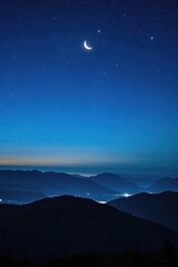 Wall Mural - night sky with a crescent and a star above a mountain range