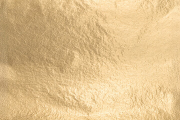 Aufkleber - Gold metallic foil texture with a smooth, soft surface. Shiny, glowing design in a rich yellow tone, creating an elegant, premium effect. Refined, minimal pattern with subtle shimmer and a clean,.
