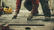 © bussi - Construction Worker Installing Floor Tiles