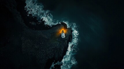 Wall Mural - an aerial view of a person sitting on a rock in the middle of the ocean with a flashlight in their h