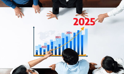 Aufkleber - A bird-eye view of business professionals examining a growth chart, illustrating projected increases from 2022 to 2025. Focus on strategy, teamwork, and future planning. Amity
