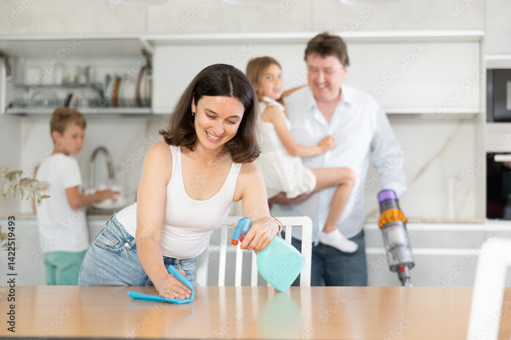 Help Family Joint family house cleaning, household help. Mom cleans kitchen table ...
