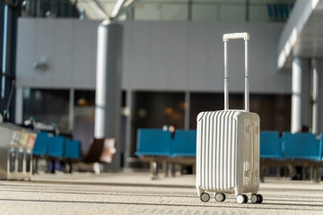 Fototapete - Travel, The suitcases in an empty airport hall, traveler cases in the departure airport terminal waiting for the area, vacation concept, blank space for text message or design, luggage for travel.