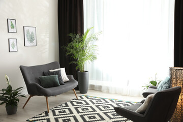 Poster - Comfortable sofa near window with elegant curtains in room