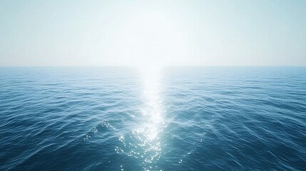 open ocean surface at daytime with bright sunlight reflecting on water