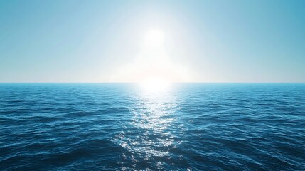 ocean view at sunset with sun glare reflecting on blue water