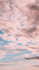 Wall Mural - vertical Cloudy Rainy Sky With Rain Heavy Clouds. Sky Natural Background. Vortical Clouds. Cloud White Blue Sky White Cloud Blue Sky. Cloudscape vertical Time Lapse. Weather Forecast Concept. Heavy