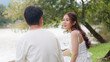 © ChayTee - Young adult asia people happy lover flirt at public nature park falling in love desire kiss hug beloved care trust. Sweet asian lovers tender face to face man woman smile relax warm time date day.
