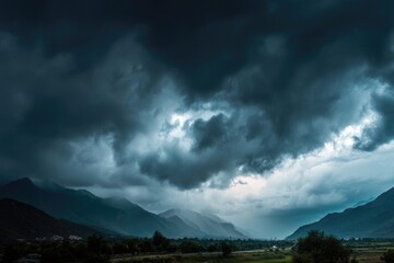 Wall Mural - dramatic overcast sky with gray clouds forming moody and tranquil backdrop before rain, capturing th