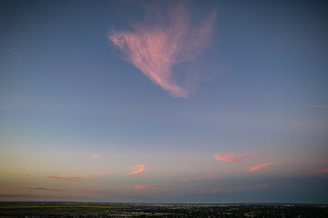 Wall Mural - beautiful sunset with a pink cloud in the sky