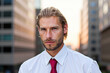 © Minerva Studio - Serious businessman posing in the financial district
