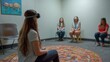 © Hungarian - A young woman wearing vr headset interacts with a group in a circle discussion.