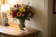 © DND - Fresh flower bouquet on a wooden table near a soft-lit wall, space for text (Bouquet)