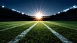 © Koplexs-Stock - Empty football stadium at sunset, illuminated by stadium lights.