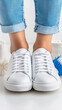 © Ruzana - Clean suede sneakers with specialized brush for perfect footwear care