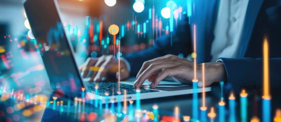 Wall Mural - person working on laptop with financial data overlay.