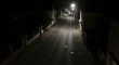 © Jismullah - Dark street scene illuminated at night