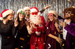 © Studio Romantic - Happy new year party, friends nightclub fun, Christmas holiday people dancing wearing funny costumes for dress ups party night event, traditional clubbing gathering socially festival with Santa Claus