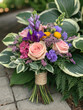 © misu - A stunning bouquet featuring an array of colorful flowers, perfect for a special occasion.