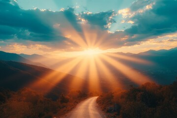 Aufkleber - Breathtaking sunset rays illuminate mountain landscape and winding road in serene evening setting