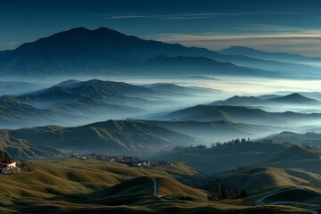 Aufkleber - Majestic mountain landscape at dawn with rolling hills and mist in the valley