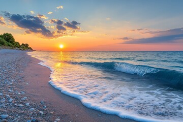 Aufkleber - Beautiful sunset over calm ocean waves at the beach with smooth sand and gentle clouds in a serene atmosphere