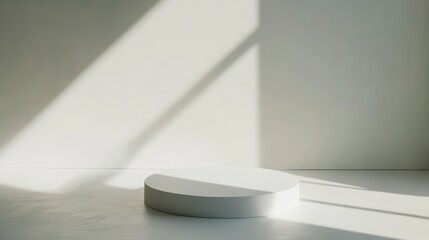 Wall Mural - Minimalist white cylindrical podium in sunlit room.
