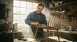© Scroopt - Craftsman sanding vintage chair