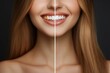© Georgy - A smiling young woman, attractive and confident, shows off her white teeth that have been beautifully cared for at the dentist, an image created using AI generative methods