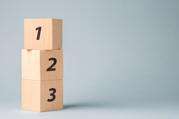 Fototapete - One, two, three, number wood blocks, step-by-step process, instructions, and procedure concept