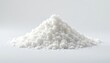 © Manae - Luminous mound of caster sugar against bright white backdrop, candy, shiny, texture