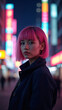 © Daniel Saldaña - A woman with vibrant pink hair poses confidently in a city at night, illuminated by colorful neon lights. She wears a dark jacket.