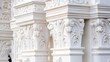 © chusnul - Intricate white architectural columns showcasing detailed carvings in a classical style