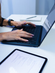 close-up of professional female software developer hand typing on keyboard, writing prompt, code on 