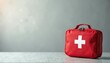 © miss irine - First aid kit with white cross symbol. Red medical case with health, safety essentials. Emergency kit for home office travel. Healthcare concept of first aid, first response. Ready for accident